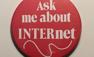 pin from the Media Archaeology Lab that reads "Ask me about INTERnet"